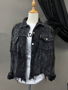 Mannequin is wearing a black distressed corduroy shacket. 