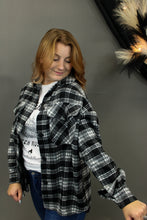 Load image into Gallery viewer, Model is wearing a black and white plaid shacket.
