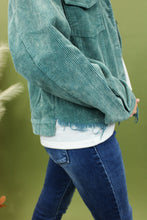 Load image into Gallery viewer, Model is wearing a hunter green color corduroy jacket. 
