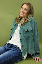 Load image into Gallery viewer, Model is wearing a hunter green color corduroy jacket. 
