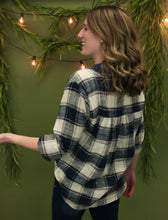 Load image into Gallery viewer, Model is wearing a navy button up top. 
