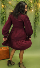 Load image into Gallery viewer, Model is wearing a burgundy dress.
