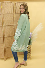 Load image into Gallery viewer, model is wearing a sage color kimono.
