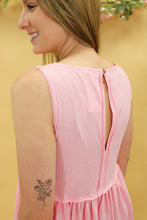 Load image into Gallery viewer, Model is wearing a pink dress with pockets.
