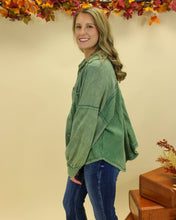 Load image into Gallery viewer, Model is wearing a green shacket. 
