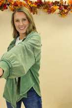 Load image into Gallery viewer, Model is wearing a green shacket. 
