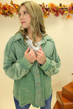 Load image into Gallery viewer, Model is wearing a green shacket. 
