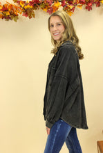 Load image into Gallery viewer, Model is wearing a black shacket. 
