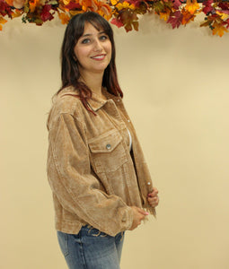 Model is wearing a beige color corduroy jacket. 