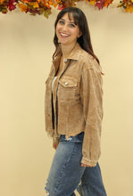 Load image into Gallery viewer, Model is wearing a beige color corduroy jacket. 
