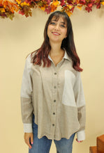 Load image into Gallery viewer, Model is wearing a button up pinstripe top. 
