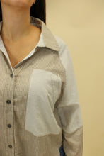 Load image into Gallery viewer, Model is wearing a button up pinstripe top. 
