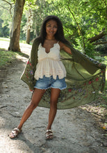 Load image into Gallery viewer, Model is wearing a green kimono with red and blue embroidered florals.
